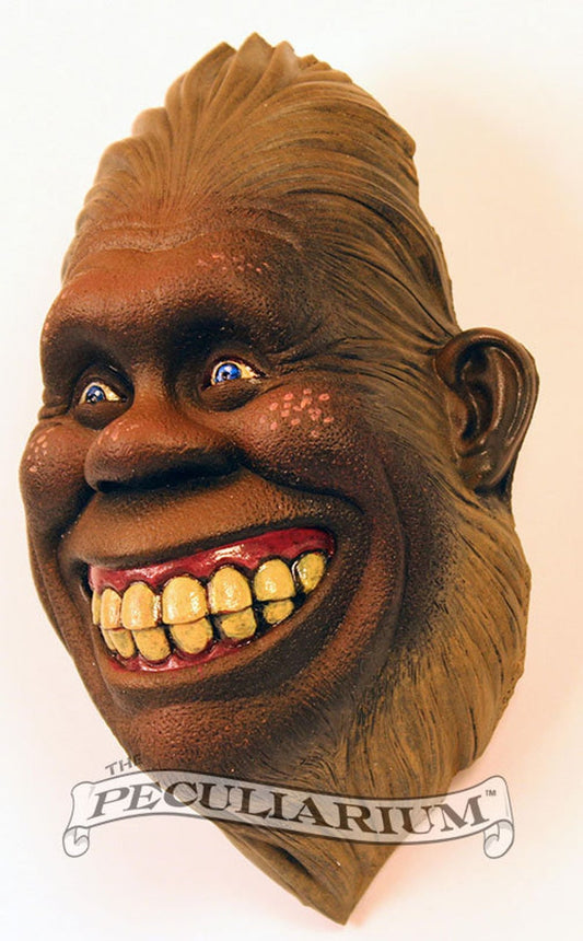 This is an amazing bust of Biggie happy and friendly, sporting his excellent oral hygene. It's stone cast from an original sculpt by master sculptor Colin Batty and each is individually hand painted.