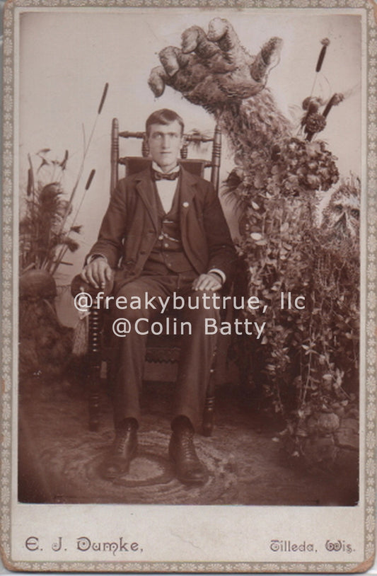 PRINT - Man with Giant Hand Behind by Colin Batty
