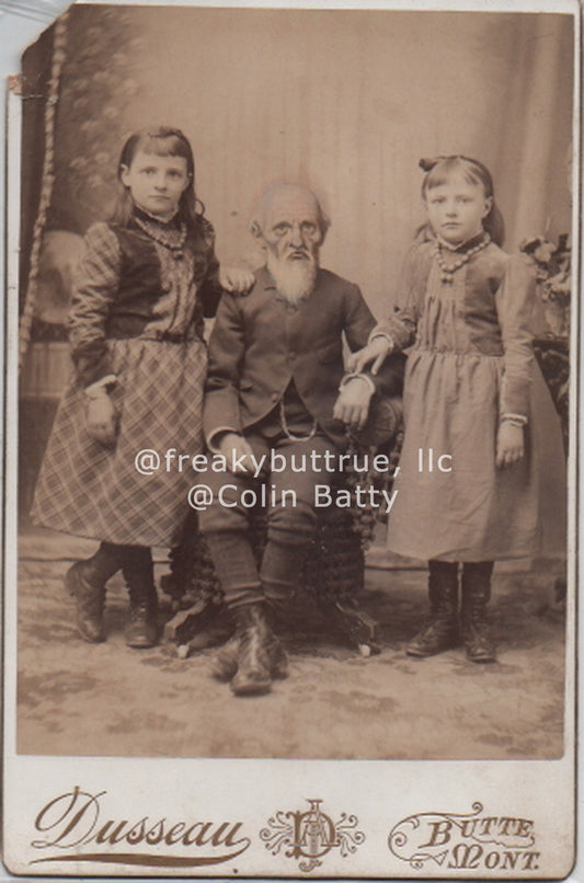 Man and Two Girls Print by Colin Batty