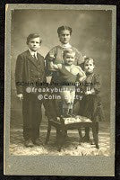 Muscle Boy with Family Print by Colin Batty