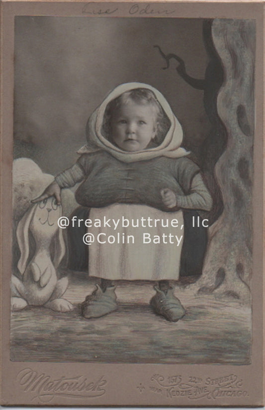 Peasant Baby with Cartoon Bunny Print by Colin Batty