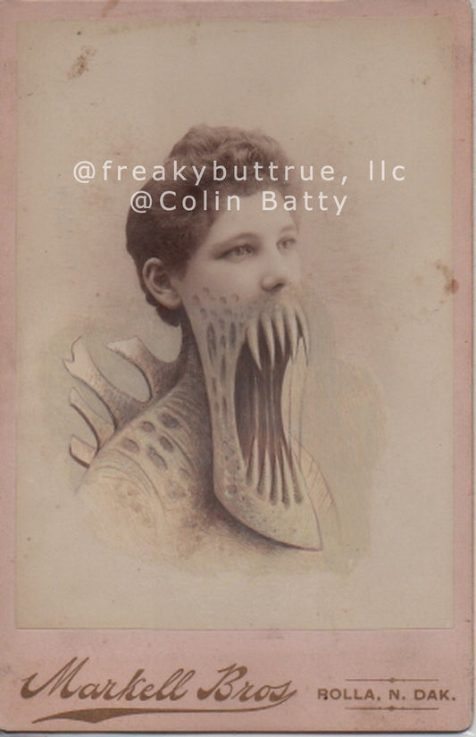 Woman with Back Plates and Dislocated Jaw Print by Colin Batty
